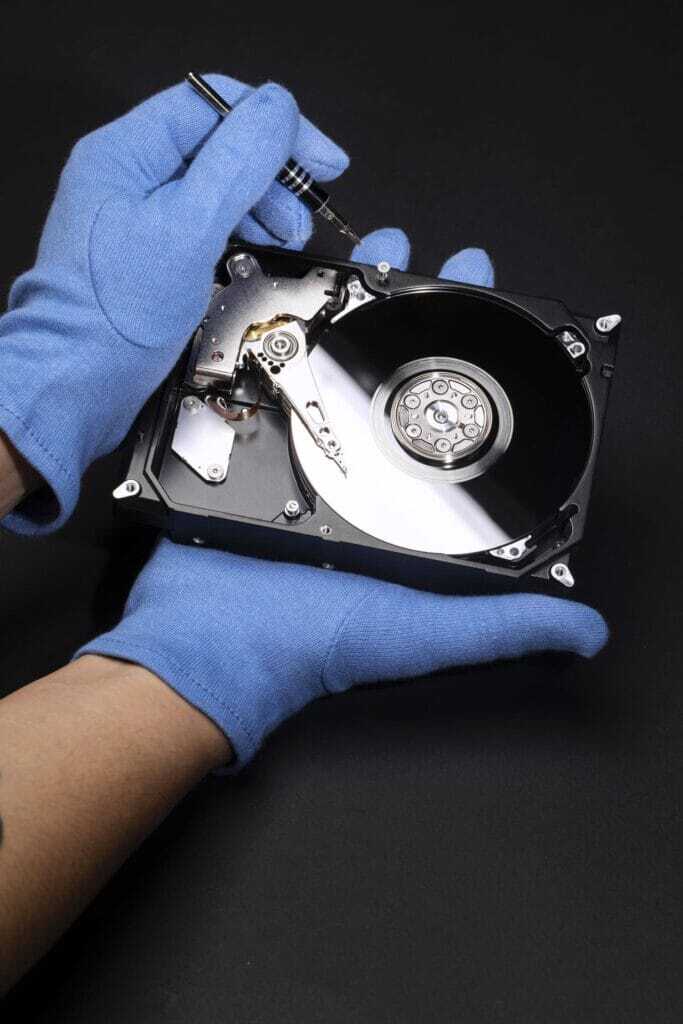 hands-gloves-hard-drive