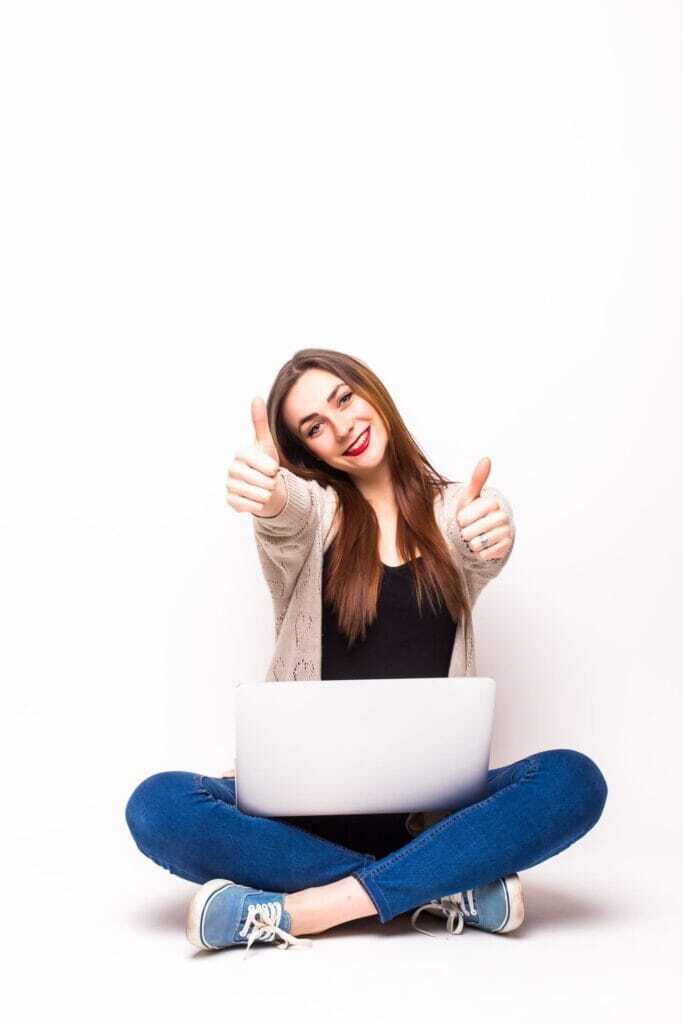 Freelancer Secrets: Proven Tips to Win More Jobs on Freelancer.com in 2025 71 happy-young-woman-with-laptop-white