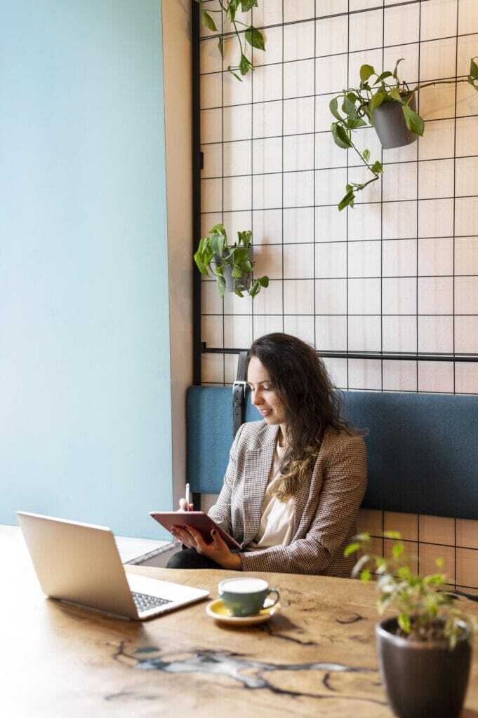 Freelancer Secrets: Proven Tips to Win More Jobs on Freelancer.com in 2025 70 medium-shot-woman-with-tablet