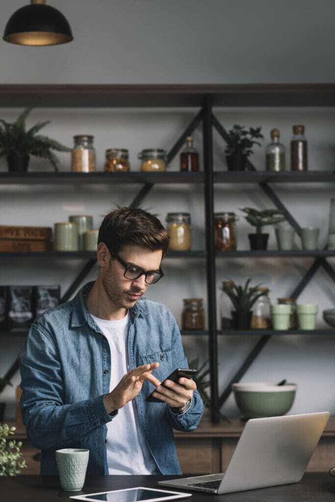 Freelancer Secrets: Proven Tips to Win More Jobs on Freelancer.com in 2025 68 young-man-using-cellphone
