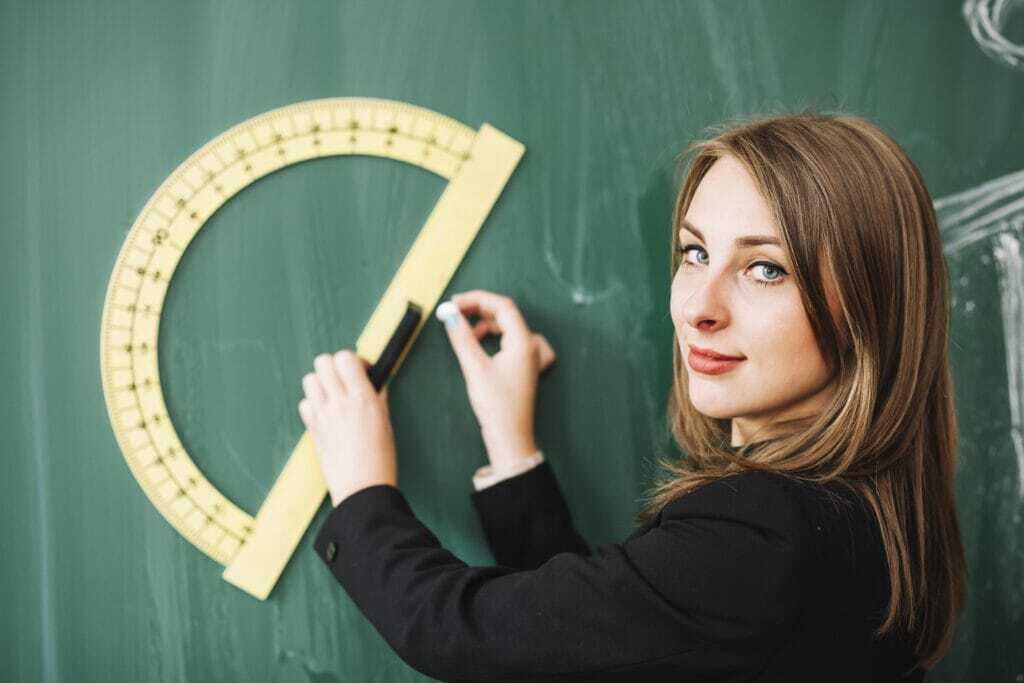 young-woman-drawing-blackboard